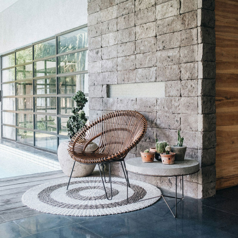 custom stone wall in indoor living outdoor patio